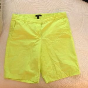 Bright neon yellow Bermuda shorts
